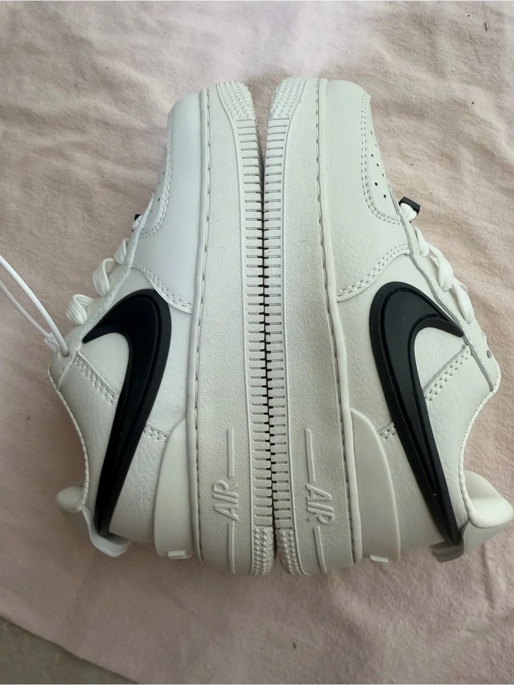 Nike Kids White Sneakers with Black Swoosh